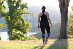 Woman wearing an Enell full coverage high impact sports bra