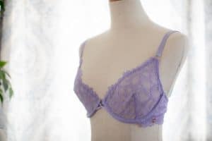 An image of a purple demi bra on a mannequin