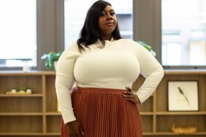 An image of a woman having a busty body