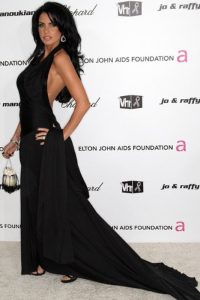 Katie Price wearing a long black gown for an event