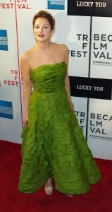 Drew Barrymore wearing a green tube dress and silver heels at the film festival