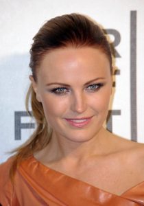 Malin Akerman wearing an orange leather dress at a film festival