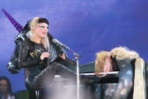 Lady Gaga wearing a sequined black body suit for her concert