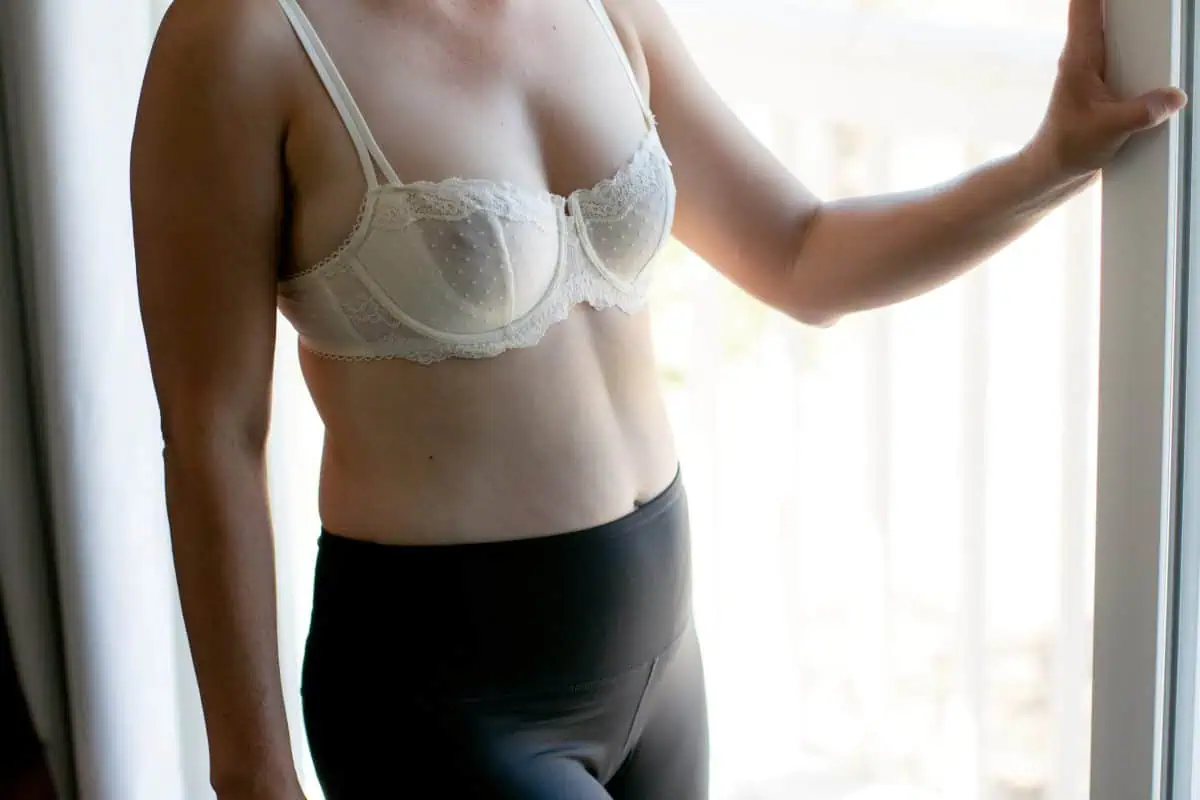 A woman wearing a balconette bra