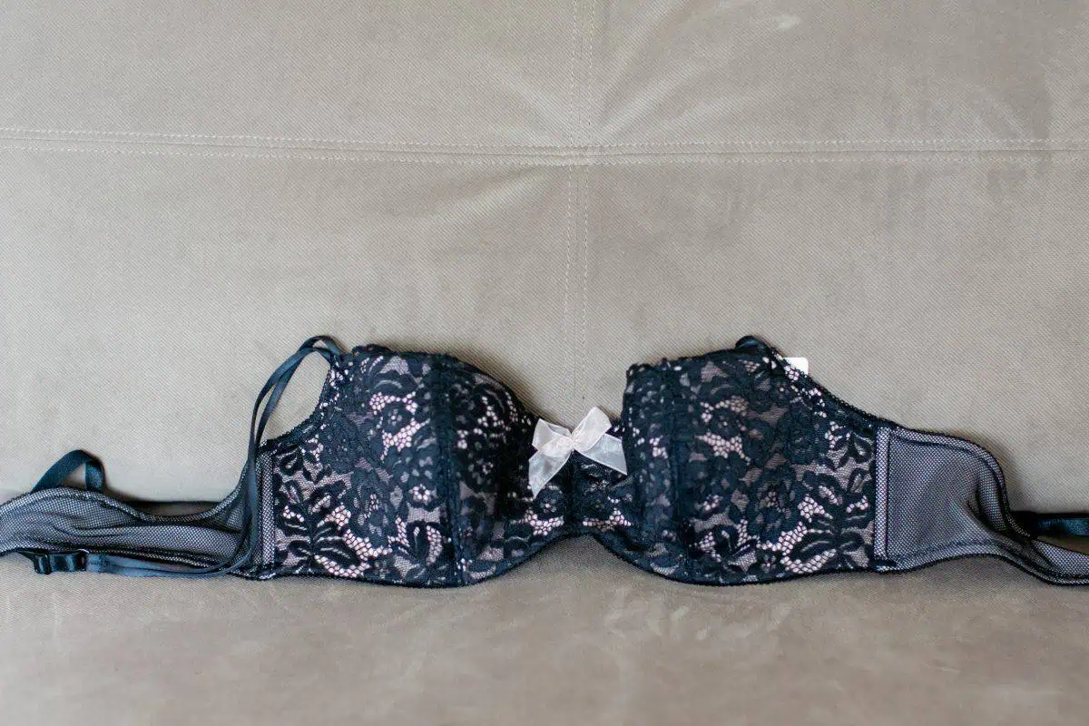 A black balconette bra