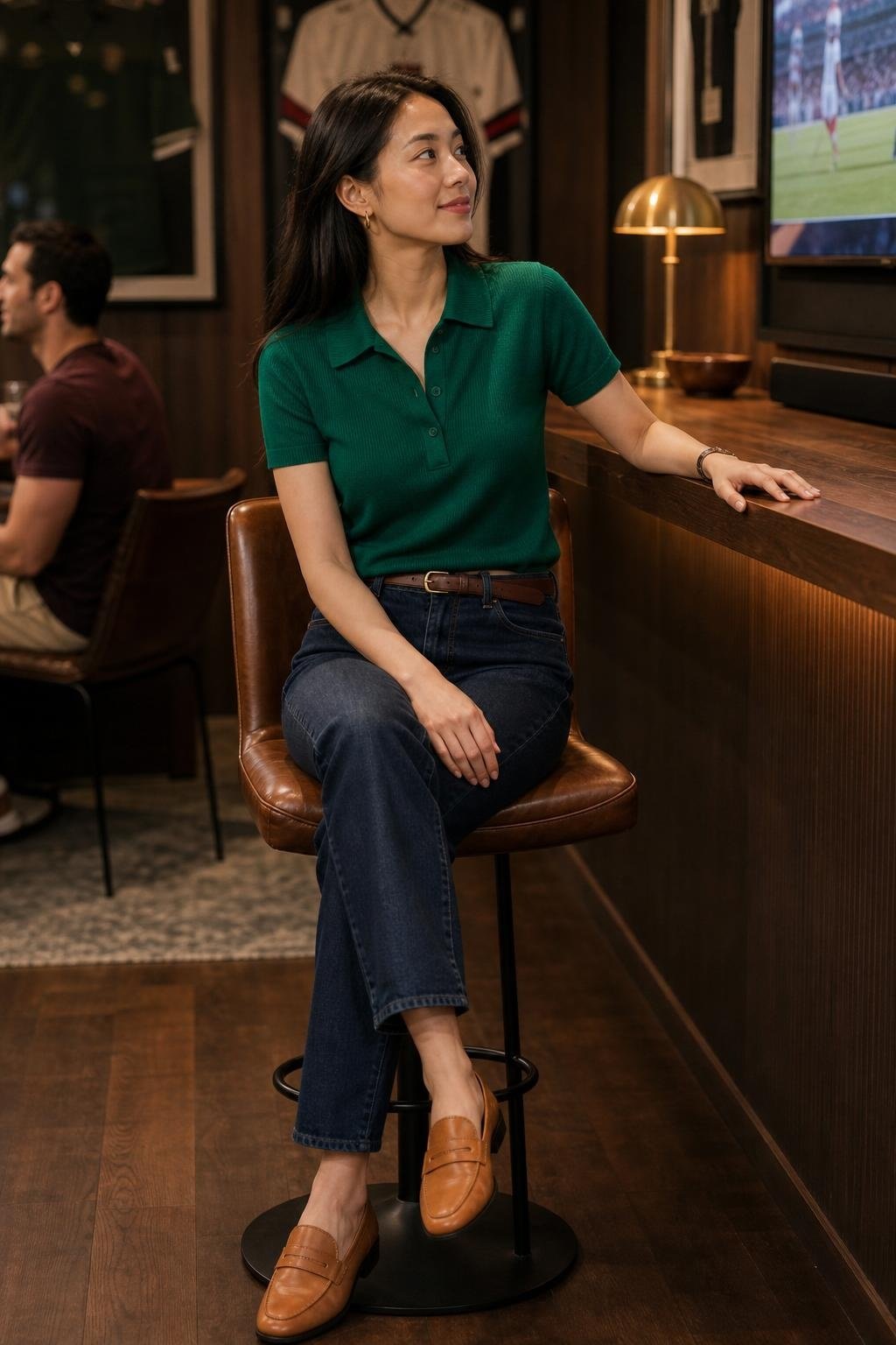 Emerald knit polo, indigo denim, tan loafers, slim belt, relaxed sports bar watch party mood (option 2)