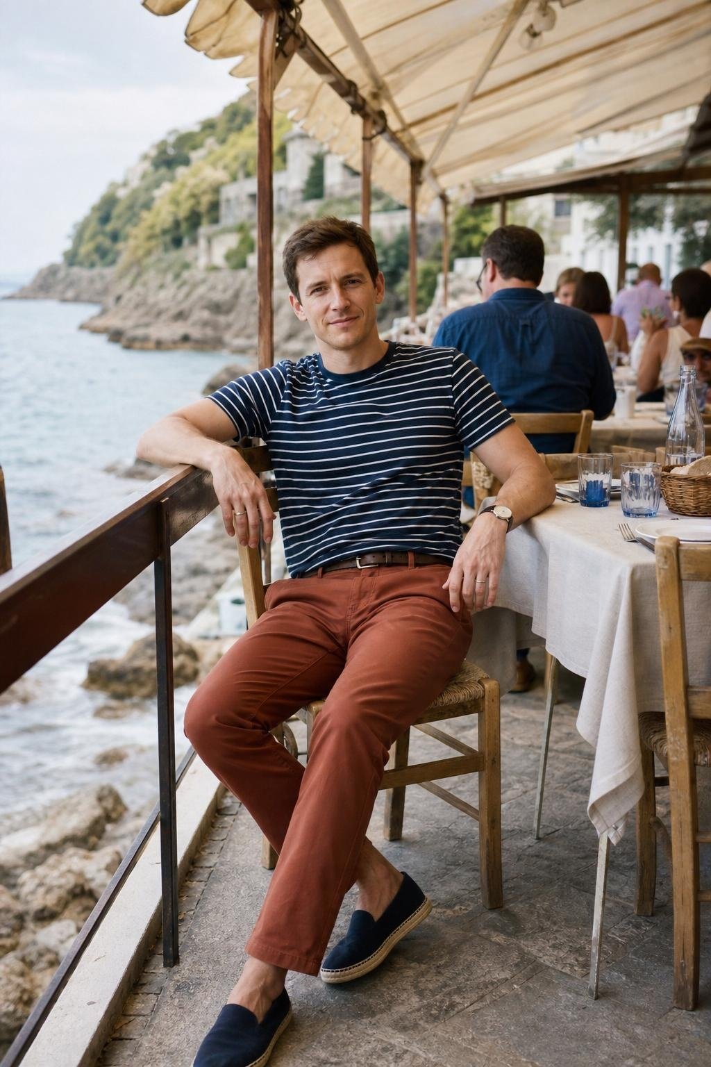 Ink blue Breton stripe tee, rust straight chinos, navy espadrilles, breezy seaside lunch (option 2)