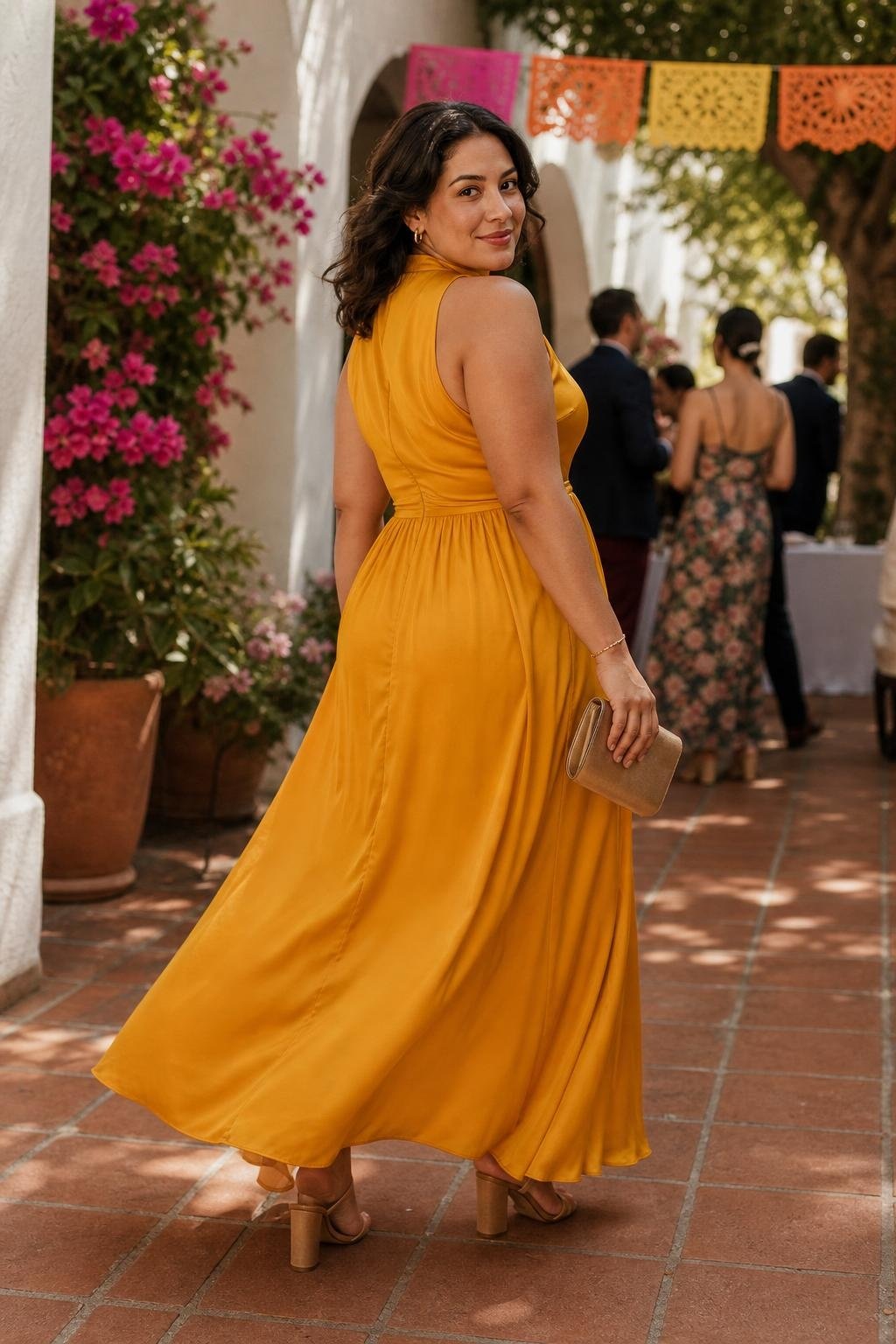 Marigold high-neck maxi dress with gathered waist, tan heels, festive late-summer courtyard wedding (option 2)