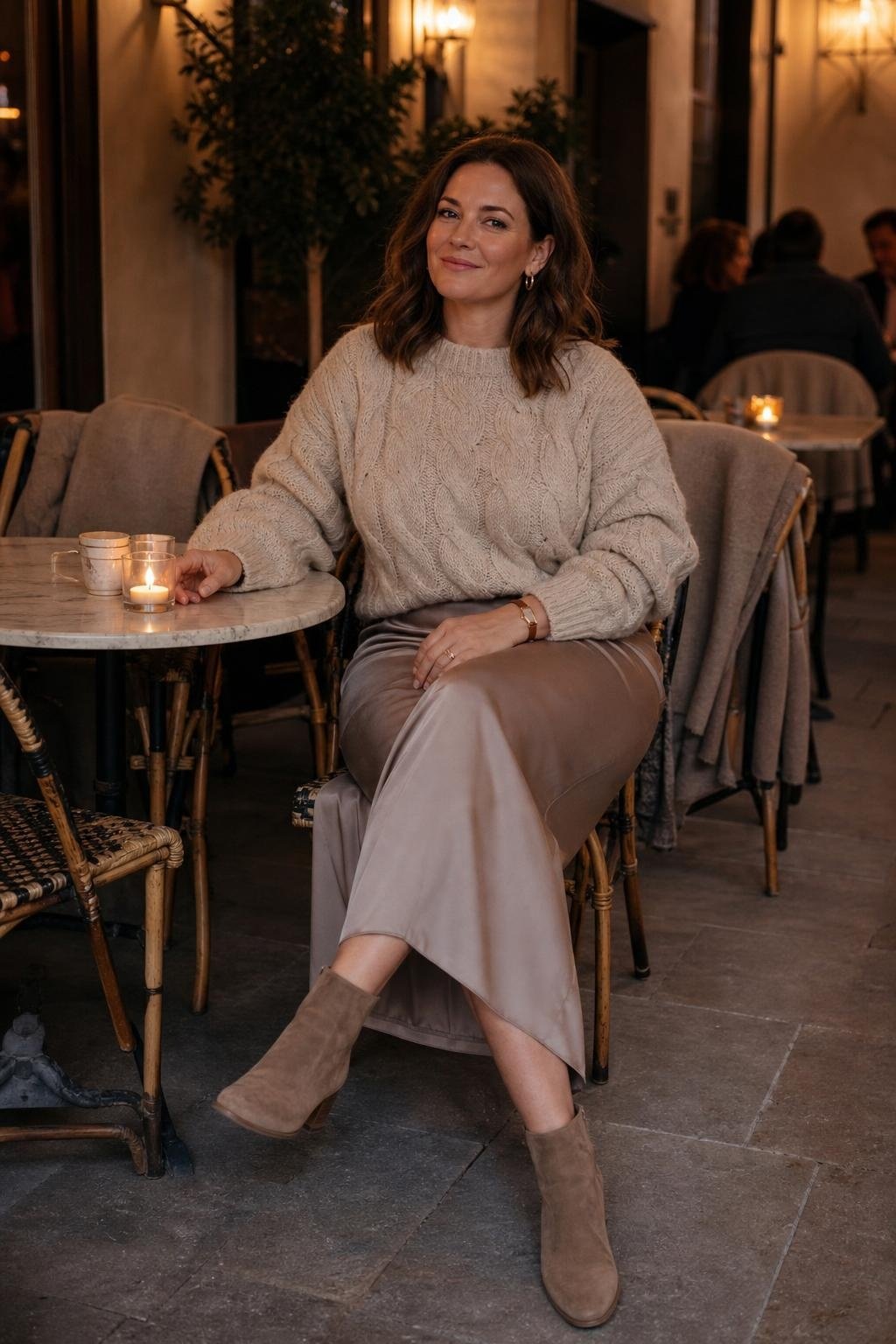 Oatmeal chunky sweater, taupe satin midi skirt, suede ankle boots, candlelit neighborhood restaurant (option 2)