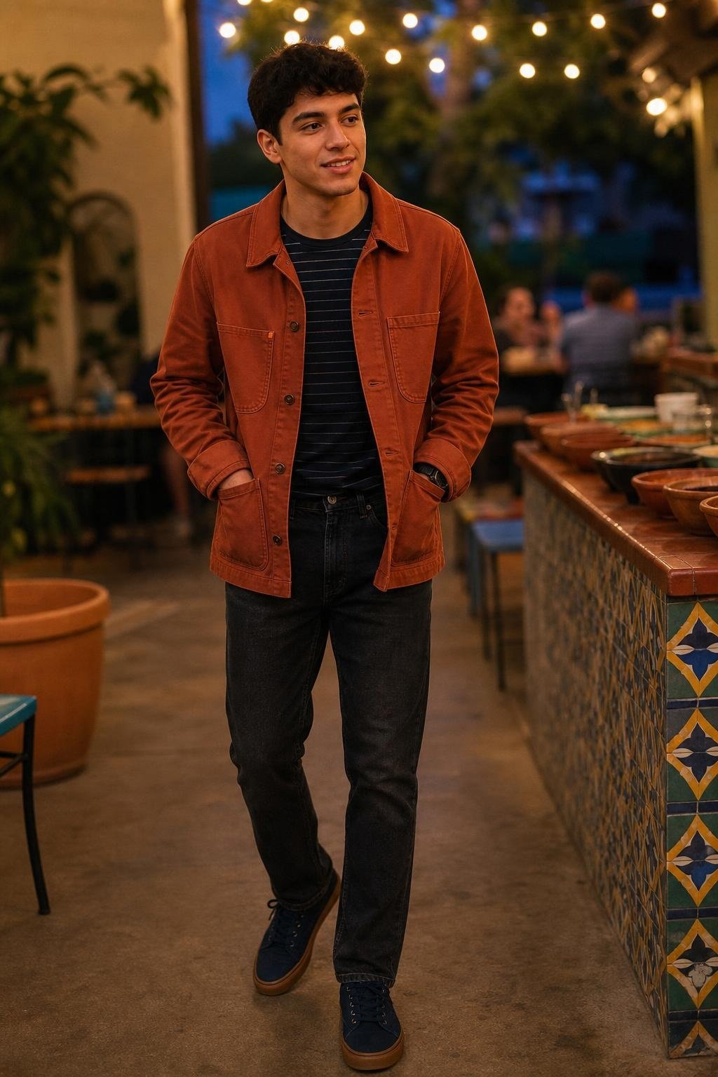 Rust chore jacket, navy striped tee, faded black jeans, canvas sneakers, casual taco date under string lights (option 2)