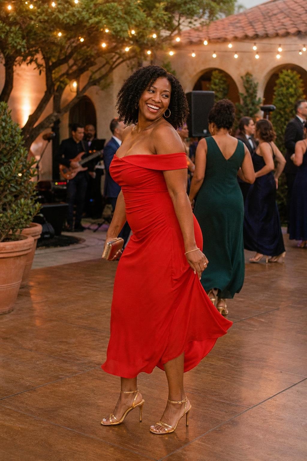 Tomato red off-the-shoulder midi dress with gold hoops at a lively courtyard wedding (option 1)