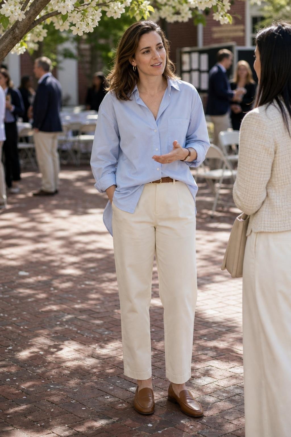 Powder blue oversized shirt with ecru chinos and tan loafers, spring school event courtyard (option 2)